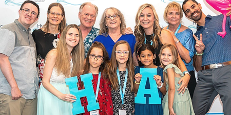 group photo oh hydrocephalus community members, showcasing a variety of ages